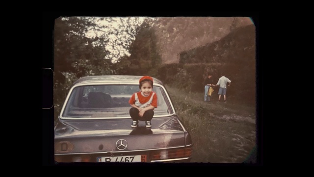 Video Reference: Car, Vehicle, Motor vehicle, Hood, Automotive lighting, Automotive design, Tree, Mode of transport, Automotive exterior, Toddler