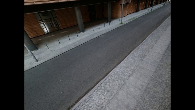 Video Reference: Road surface, Building, Wood, Asphalt, Flooring, Floor, Sidewalk, Composite material, Window, Tints and shades