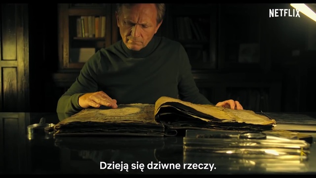 Video Reference: Flash photography, Font, Music, Darkness, Eyewear, Publication, Sitting, Room, T-shirt, Facial hair