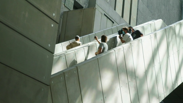 Video Reference: Vertebrate, Material property, Composite material, Building, Rectangle, Facade, Handrail, Metal, Fence, Concrete