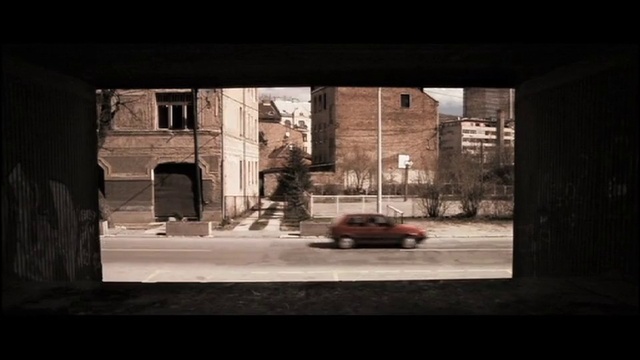 Video Reference: Window, Building, Car, Plant, Vehicle, Tints and shades, Tire, Rectangle, Wheel, City