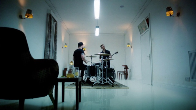 Video Reference: Furniture, Chair, Interior design, Floor, Musician, Flooring, Audio equipment, Event, Technology, Entertainment