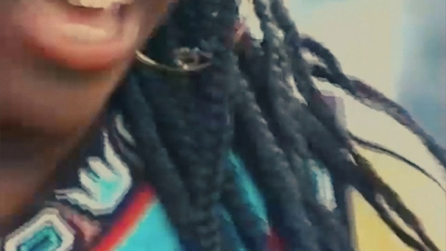 Video Reference: Textile, Gesture, Smile, Electric blue, Eyewear, Woolen, Rope, Pattern, Fashion accessory, Selfie