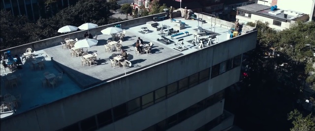 Video Reference: Plant, Urban design, City, Tree, Facade, Roof, Table, Landscape, Chair, Mixed-use