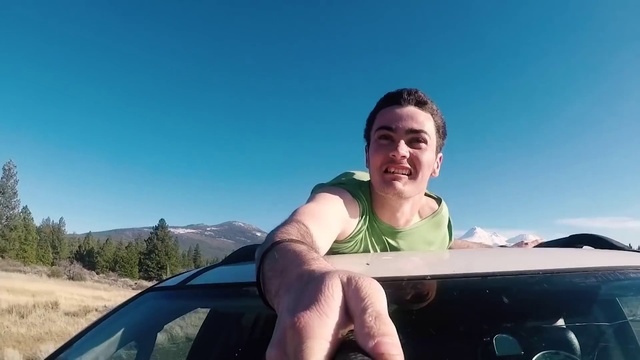 Video Reference: Sky, Vehicle, Hood, Car, Motor vehicle, Plant, Automotive design, Bumper, Eyewear, Gesture