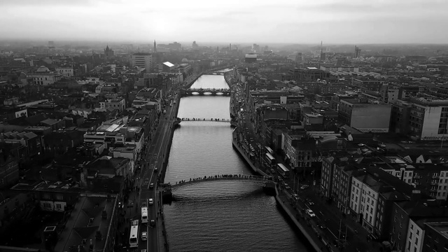 Video Reference: Water, Sky, Building, Cloud, Tower block, Urban design, Black-and-white, Body of water, Style, Cityscape