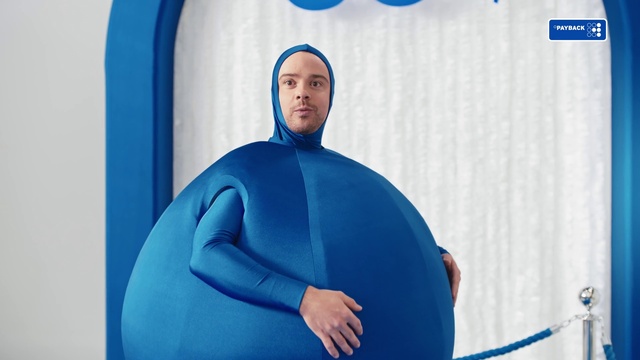 Video Reference: Blue, Azure, Human body, Sleeve, Gesture, Electric blue, Sitting, Fictional character, Personal protective equipment, T-shirt