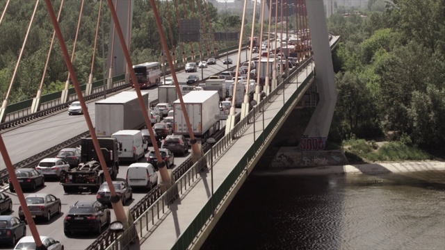 Video Reference: Wheel, Water, Tire, Car, Vehicle, Infrastructure, Plant, Tree, Thoroughfare, Motor vehicle