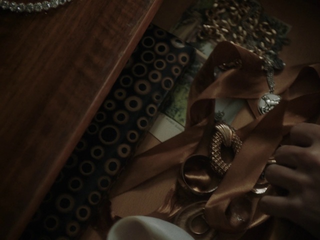 Video Reference: Brown, Flash photography, Tableware, Audio equipment, Kitchen utensil, Office equipment, Goggles, Wood, Darkness, Metal