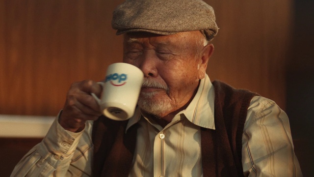 Video Reference: Clothing, Nose, Eye, Cap, Flat cap, Ear, Drinkware, Dress shirt, Cup, Microphone