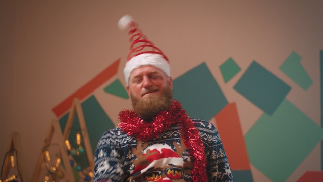 Video Reference: Smile, Beard, Human body, Lei, Happy, Headgear, Facial hair, Event, Fun, Entertainment