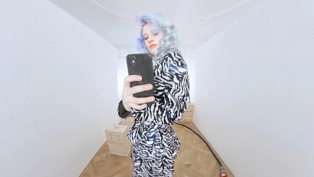 Video Reference: Mobile phone, Human body, Dress, Sleeve, Waist, Gesture, Street fashion, Eyewear, Fashion design, Art