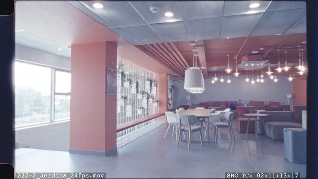 Video Reference: indoor, lounge, cafe, restaurant, modern interior, tables, chairs, pendant lights, large windows, empty room, pink walls, workspace, seating area, open space, interior design