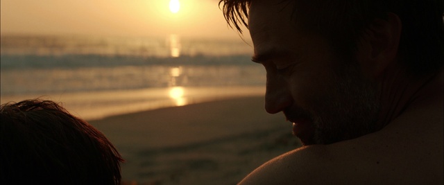 Video Reference: Water, Light, Sky, Amber, Sunlight, Lighting, Gesture, Flash photography, Body of water, Beach