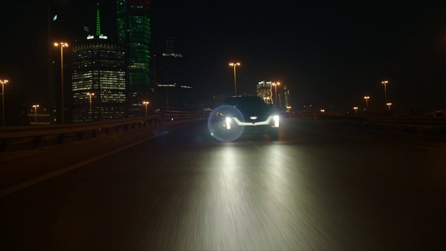 Video Reference: Tire, Wheel, Vehicle, Automotive lighting, Car, Building, Road surface, Mode of transport, Asphalt, Automotive design