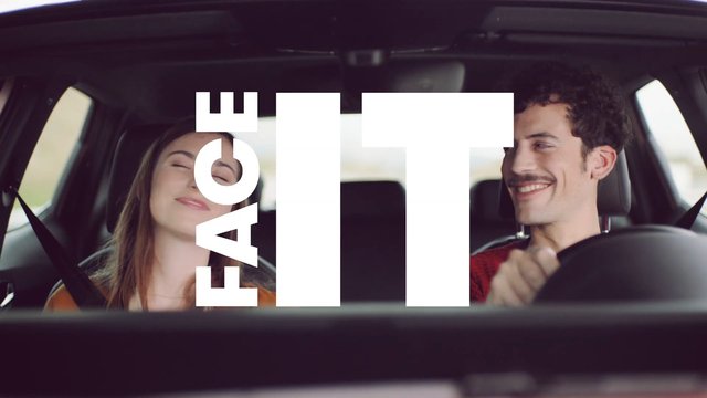 Video Reference: car, interior, two people, smiling, front seats, driving, text overlay, couple, road trip, vehicle, portrait, commercial
