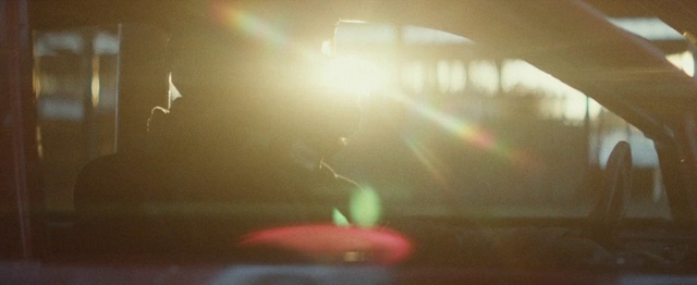 Video Reference: Automotive lighting, Lens flare, Tints and shades, Entertainment, Event, Liquid, Darkness, Fin, Auto part, Room