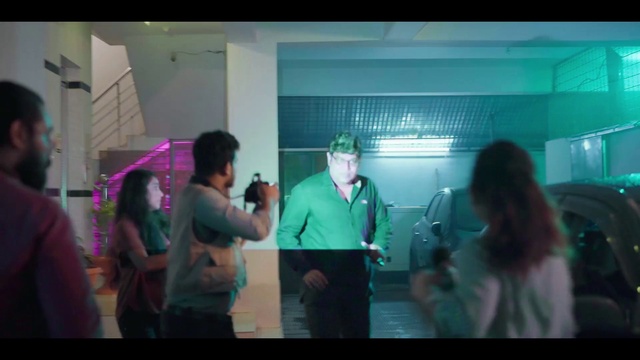 Video Reference: Entertainment, Fun, Leisure, Music, Event, Magenta, Display device, T-shirt, Room, Microphone