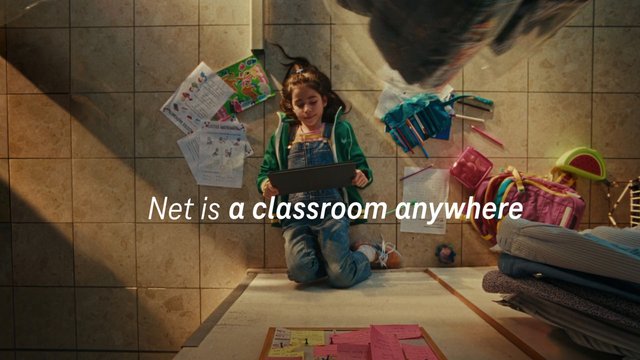 Video Reference: child, tablet, school supplies, papers, notebooks, backpack, floor, top view, education, home learning, study, classroom, overhead shot, text overlay, indoor, family