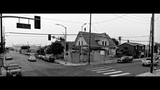 Video Reference: Sky, Car, Building, Wheel, Window, Vehicle, Motor vehicle, Asphalt, Street light, Road surface