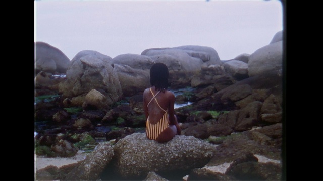 Video Reference: Sky, Bedrock, Travel, Landscape, Art, Outcrop, Leisure, Rock, Hill, Sitting