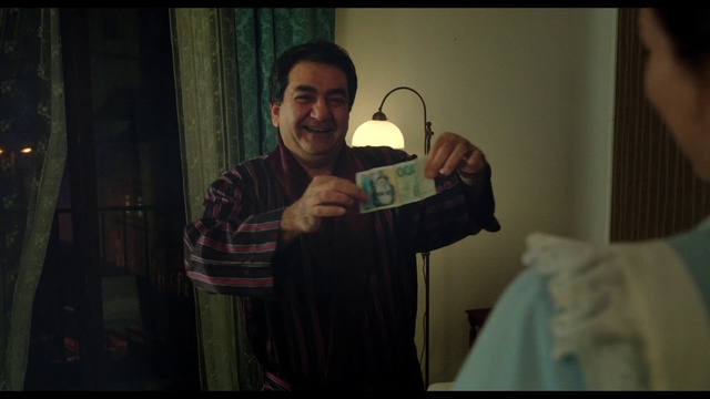 Video Reference: Shoulder, Jaw, Sleeve, Flash photography, Gesture, Eyewear, Facial hair, Smile, Beard, T-shirt