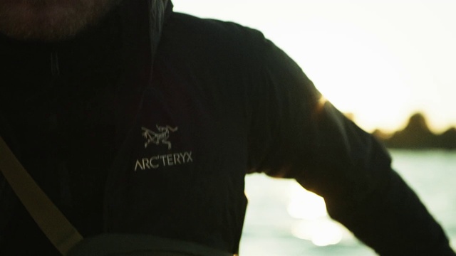 Video Reference: Human body, Sleeve, Gesture, Flash photography, T-shirt, Elbow, Font, Tints and shades, Darkness, Street fashion