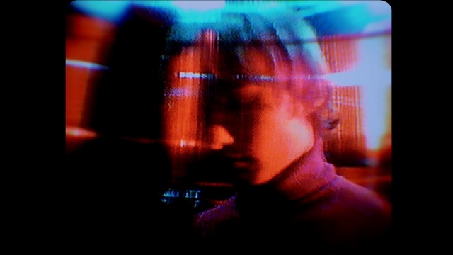 Video Reference: Mouth, Purple, Magenta, Entertainment, Flash photography, Display device, Electric blue, Event, Rectangle, Font