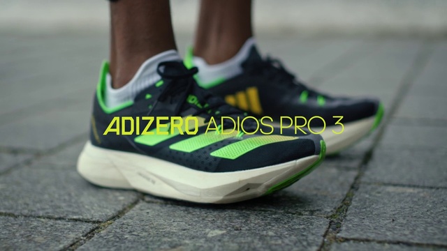 Video Reference: Footwear, Shoe, Walking shoe, Grey, Sportswear, Sneakers, Grass, Outdoor shoe, Font, Electric blue