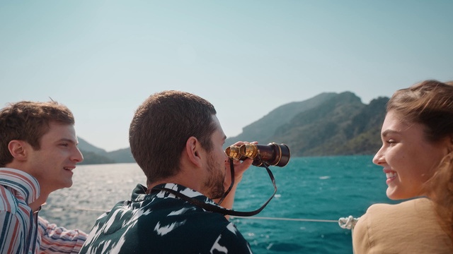 Video Reference: Hair, Water, Sky, Smile, Mountain, Body of water, Gesture, Lake, Travel, Happy