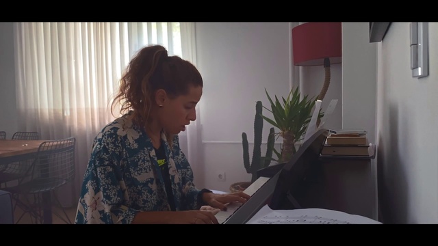 Video Reference: Shoulder, Plant, Window, Houseplant, Happy, Wood, Long hair, Office equipment, Pianist, Conversation