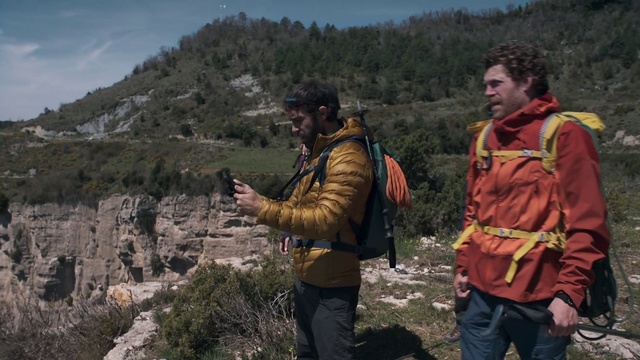 Video Reference: Plant, Sky, Mountain, Tree, Mountainous landforms, Bedrock, Landscape, Jacket, Windbreaker, Geological phenomenon