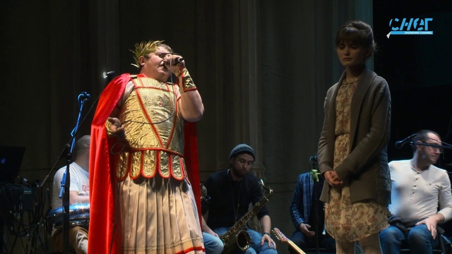 Video Reference: Microphone, Musician, Entertainment, Performing arts, Music, Fashion design, Artist, Event, Performance art, Costume design