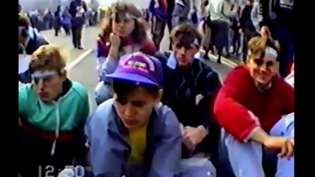 Video Reference: Clothing, Hat, Headgear, Violet, Crowd, Sharing, Leisure, Fan, Competition event, Recreation