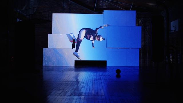 Video Reference: Blue, Building, Art, World, Entertainment, Performing arts, Display device, Electric blue, Space, Event