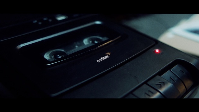 Video Reference: Communication Device, Portable communications device, Gadget, Electronic device, Personal luxury car, Electric blue, Font, Multimedia, Automotive design, Composite material