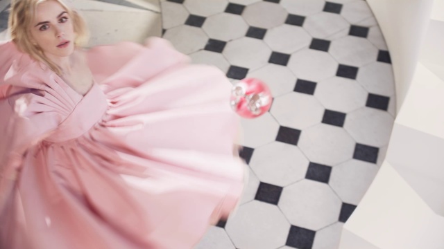 Video Reference: Eyelash, Dress, Petal, Flash photography, Pink, Waist, Flooring, Thigh, Comfort, Material property