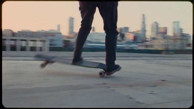 Video Reference: Shoe, Leg, Sky, Flash photography, Sports equipment, Kickflip, Skateboarder, Skateboard, Rolling, Asphalt