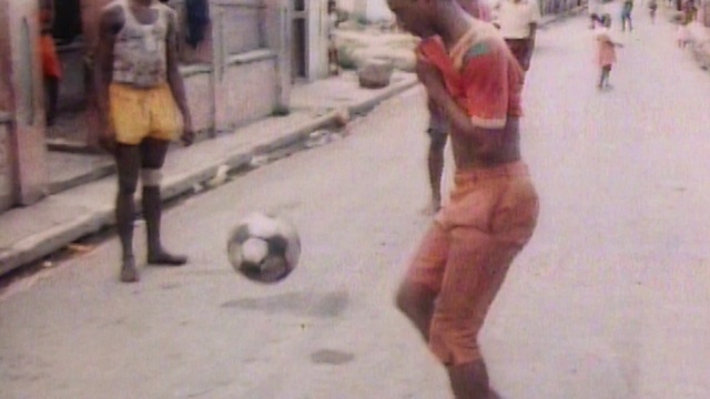 Video Reference: Soccer, Leg, Sports equipment, Shorts, Ball, Football, Mammal, Hat, Street football, Sports