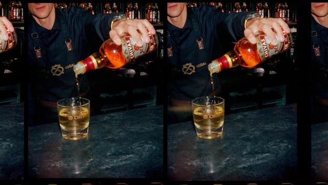 Video Reference: Bottle, Tableware, Drinkware, Beer, Drinking establishment, Barware, Fluid, Alcoholic beverage, Glass bottle, Drink