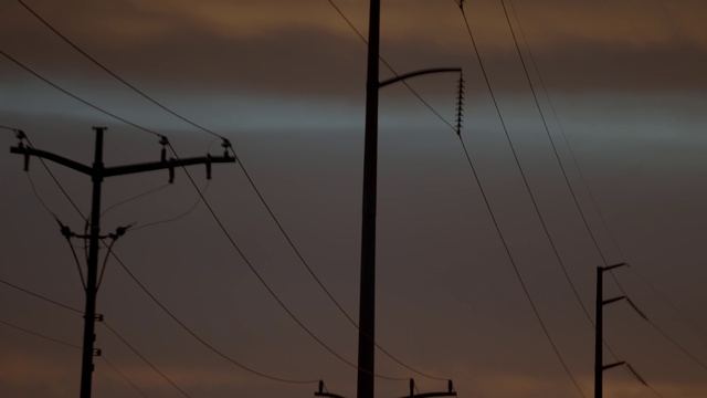 Video Reference: Cloud, Sky, Atmosphere, Branch, Afterglow, Overhead power line, Electricity, Transmission tower, Dusk, Electrical wiring