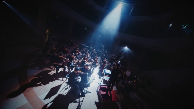 Video Reference: Performing arts, Sky, Entertainment, Music, Event, Concert, Space, Music venue, Darkness, Electric blue