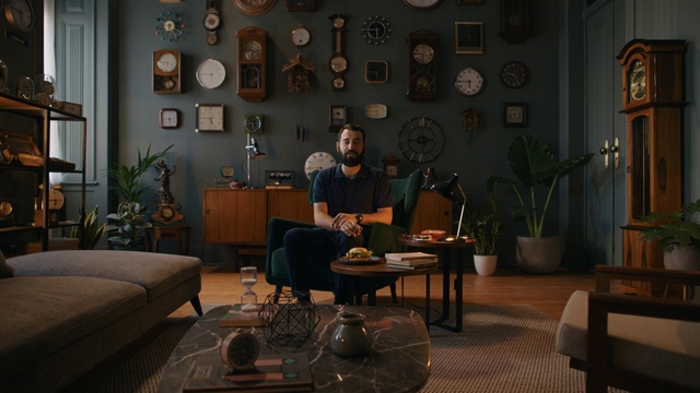 Video Reference: Furniture, Picture frame, Plant, Table, Comfort, Interior design, Building, Houseplant, Living room, Lamp