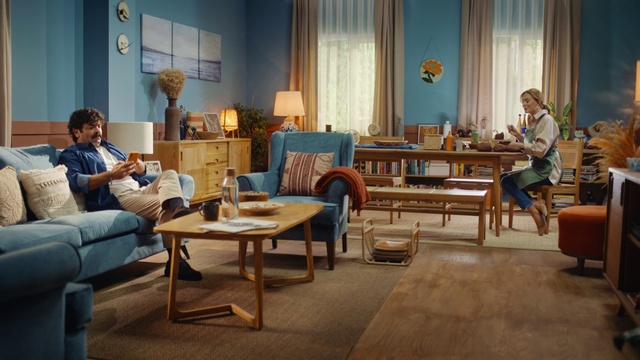 Video Reference: Furniture, Property, Table, Picture frame, Azure, Comfort, Couch, Curtain, Living room, Flooring