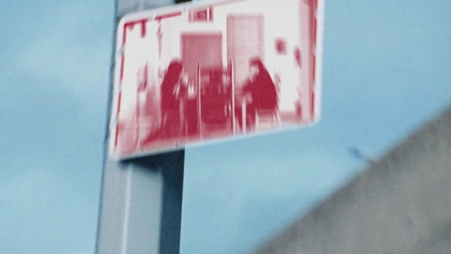 Video Reference: Building, Billboard, Art, Font, Magenta, Facade, Rectangle, Glass, Signage, Poster