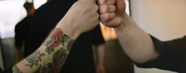 Video Reference: Skin, Human body, Sleeve, Gesture, Finger, Nail, Thumb, Wrist, Temporary tattoo, Elbow