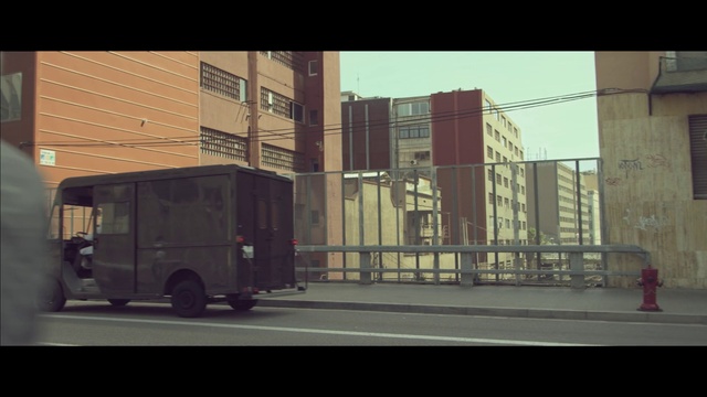 Video Reference: Wheel, Tire, Building, Automotive tire, Automotive lighting, Motor vehicle, Vehicle, Asphalt, Automotive exterior, Fender