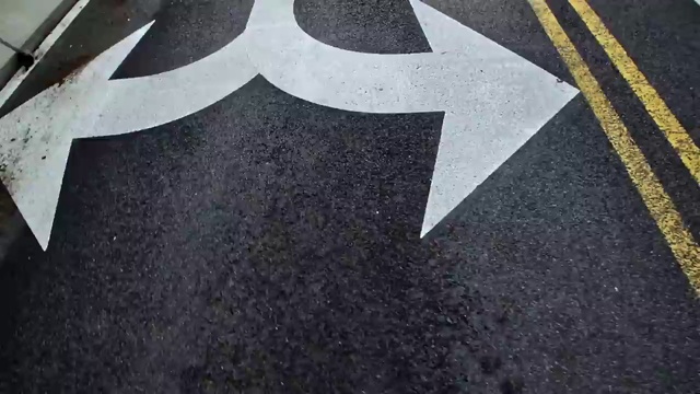 Video Reference: Road surface, Asphalt, Grey, Tar, Font, Floor, Flooring, Automotive tire, Sidewalk, Tints and shades