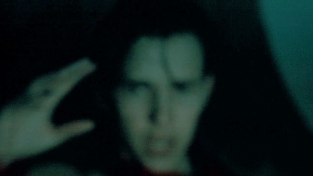 Video Reference: Hair, Eye, Human body, Jaw, Gesture, Eyelash, Art, Electric blue, Darkness, Fiction