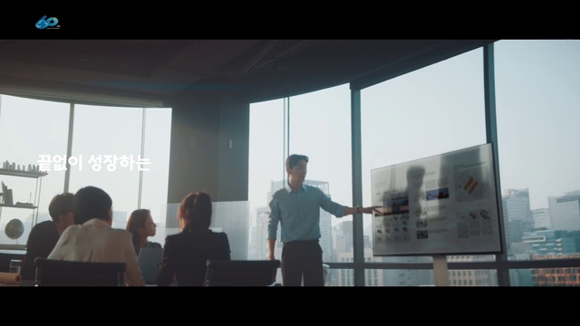 Video Reference: Building, Event, Presentation, Suit, Glass, White-collar worker, Display device, Stage equipment, Projection screen, Job